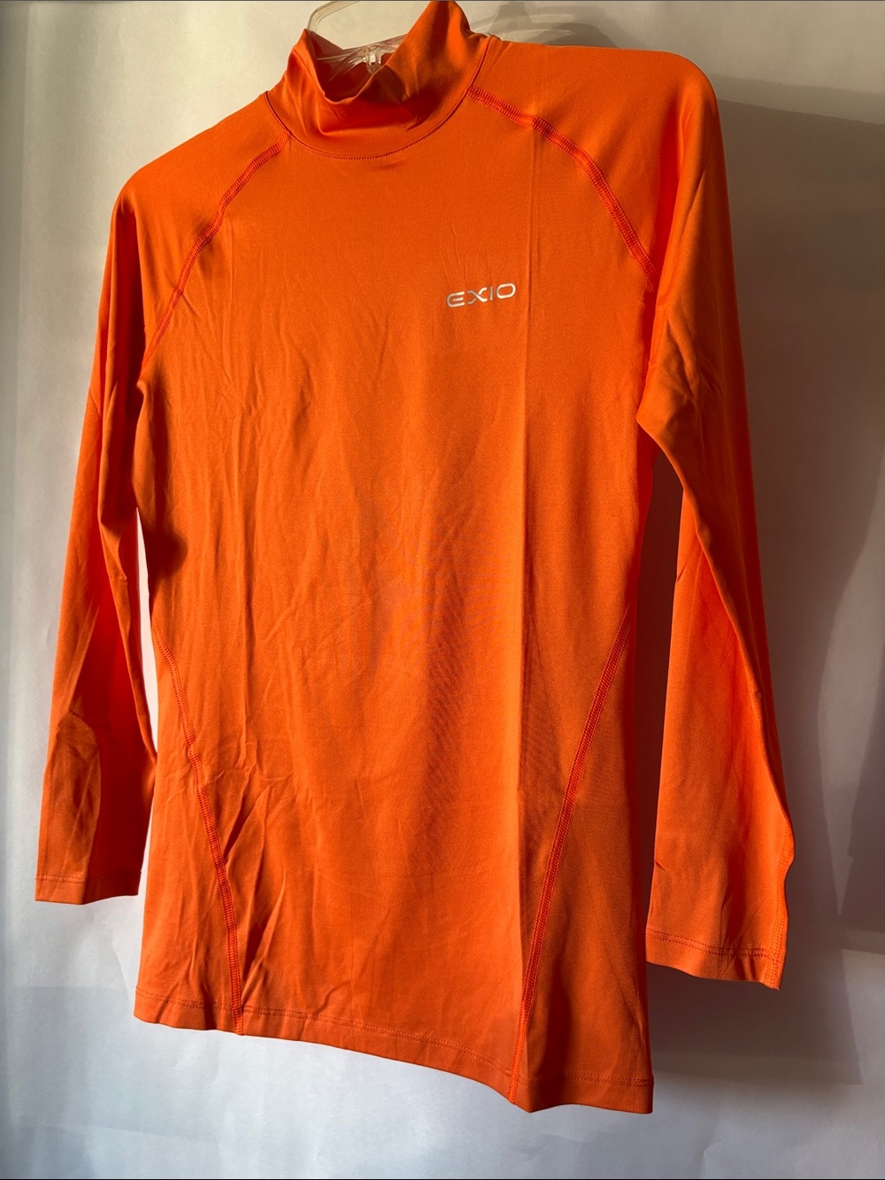 Women/ men Long Sleeve Performance Top in Bright Orange